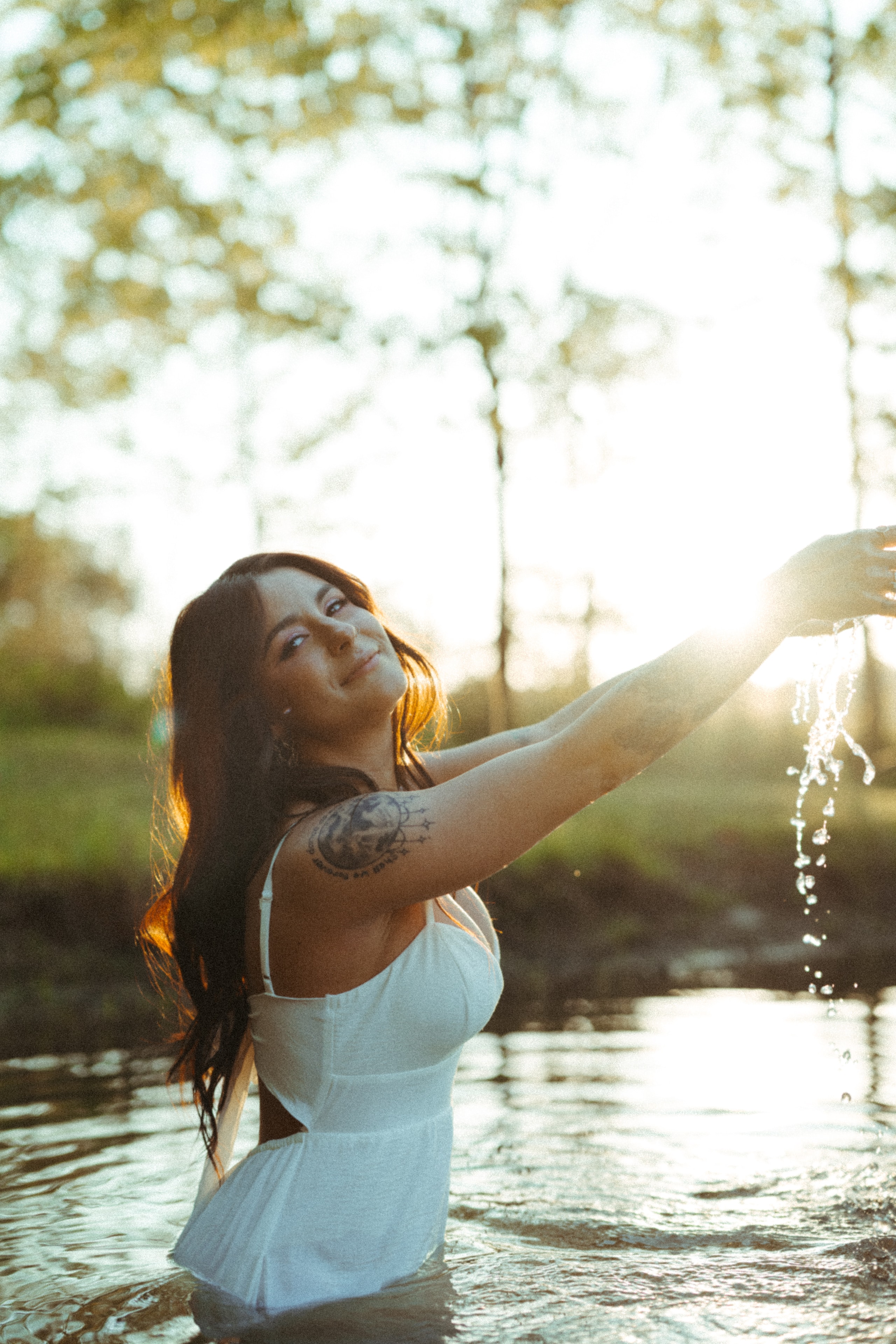 Krystal in golden light near water